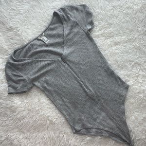 Gray zip-up bodysuit